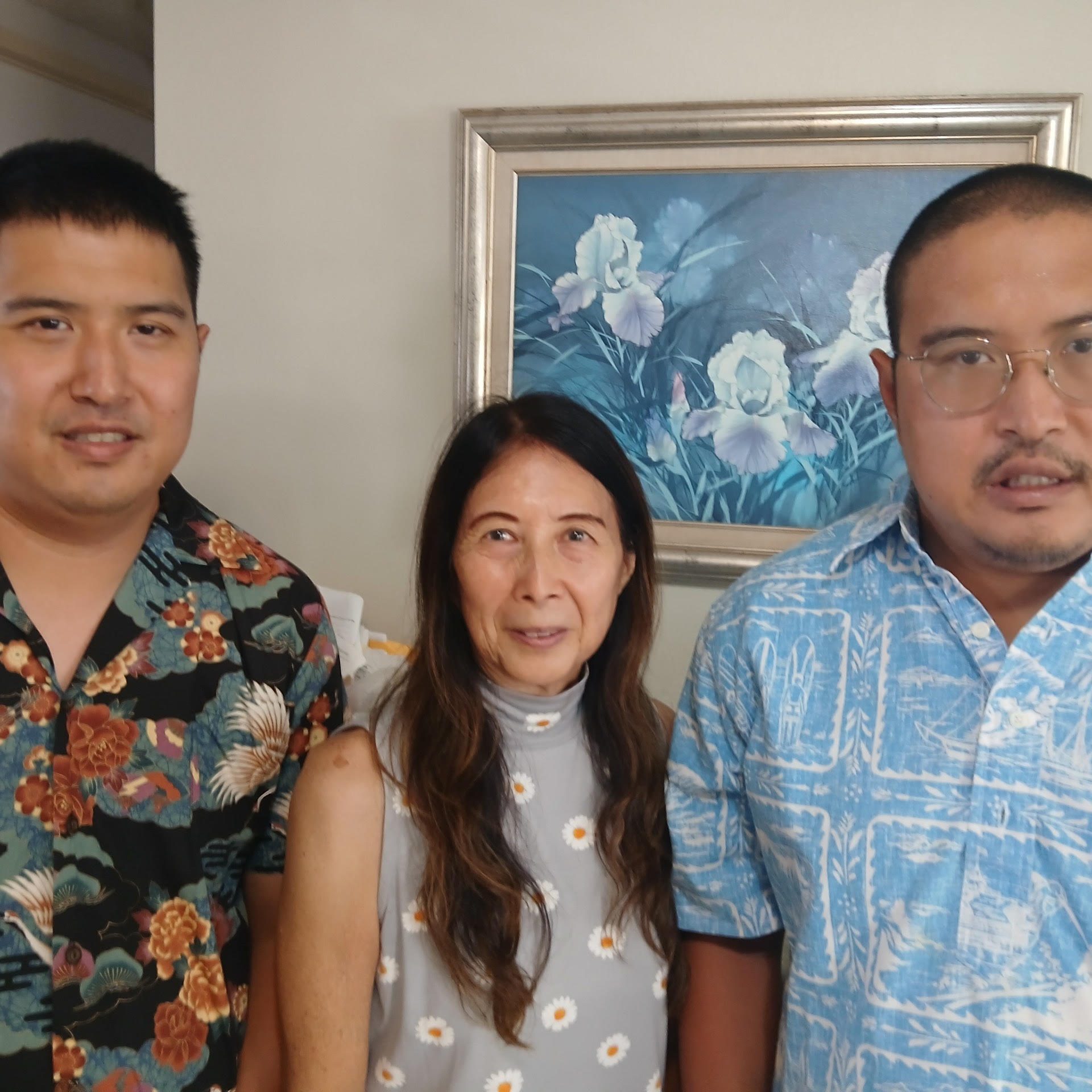 Image of the Ishiki Family. Cheryl Ishiki (center), and her twin sons, Kurt Ishiki (left) and Seth Ishiki (right).